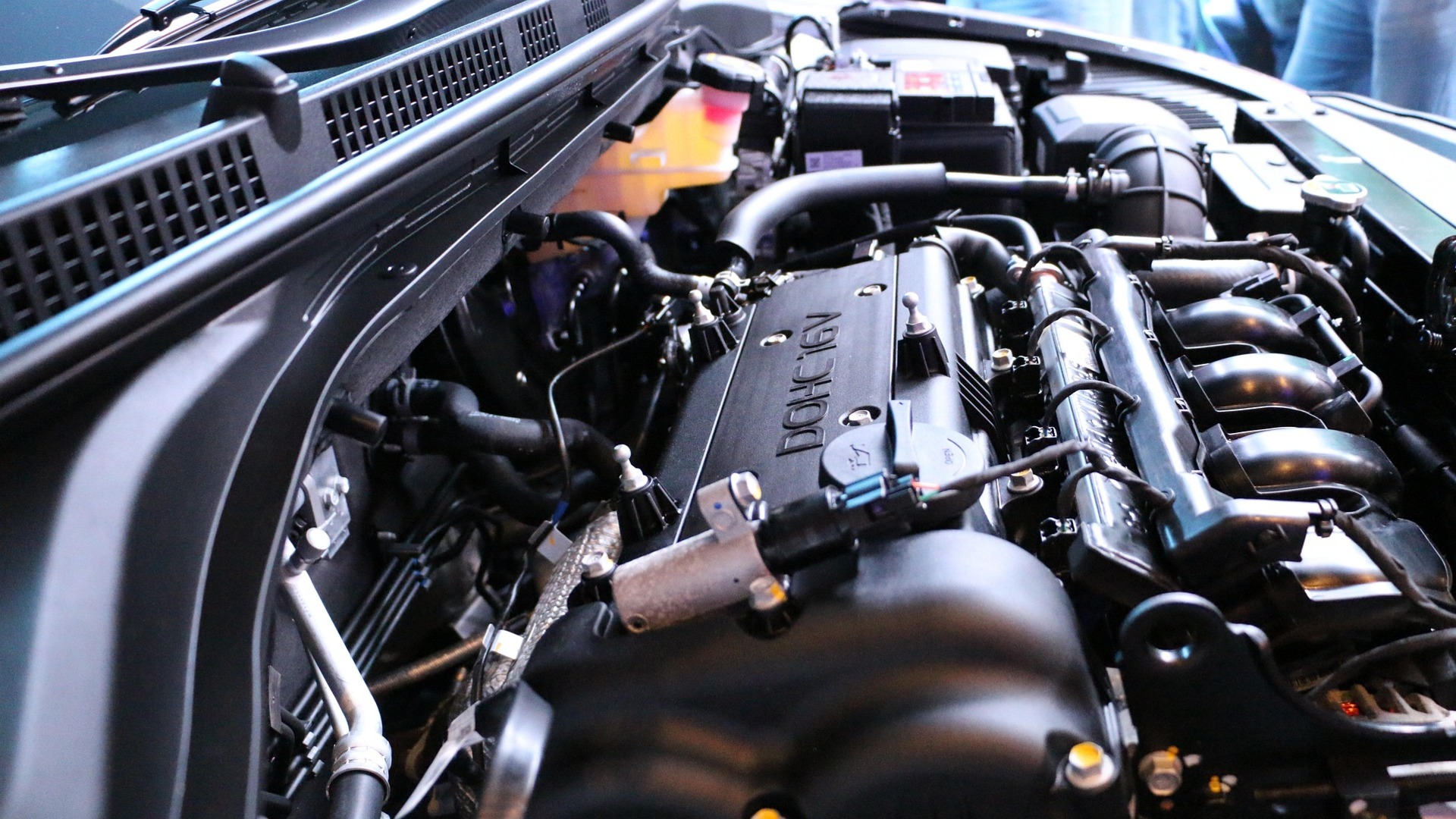 AutoCare Preston garage workshop with mechanics working on vehicles